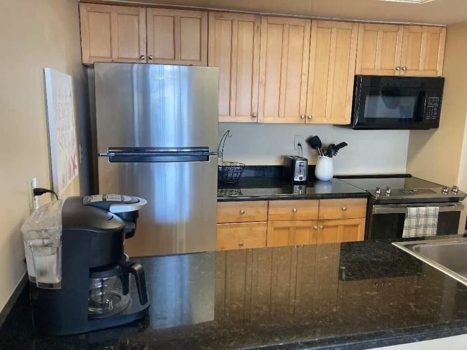 The fully equipped kitchen has everything you need to whip up delicious meals.