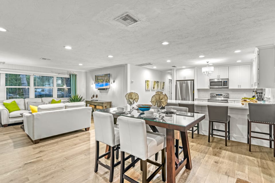 Share laughter and delicious meals at this elegant dining table, where every gathering feels special.