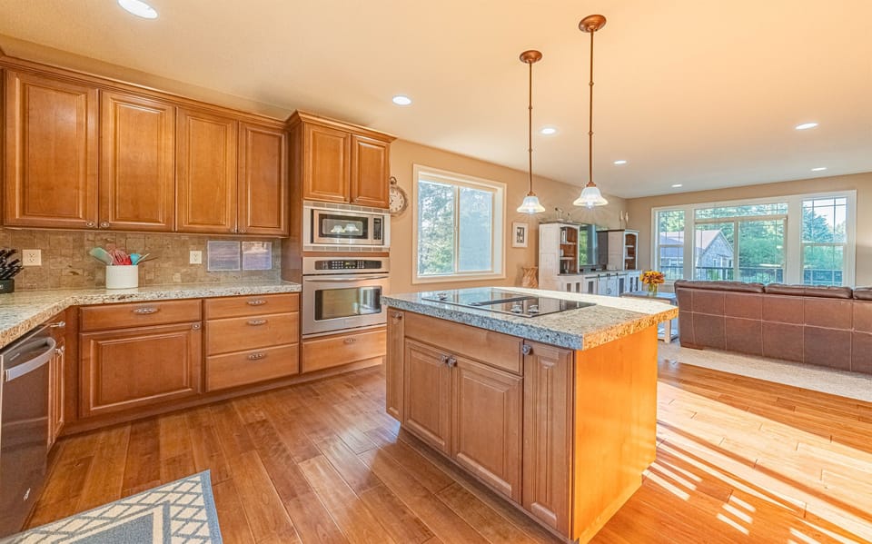 Open concept floor plan - kitchen flows seamlessly into family room.
