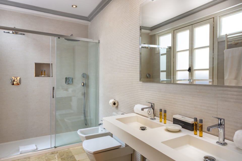 Apartment     (Outside the main building) | Bathroom | Rainfall showerhead, free toiletries, hair dryer, bathrobes