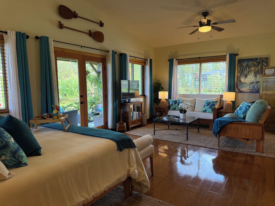 View of living room from bedroom area.