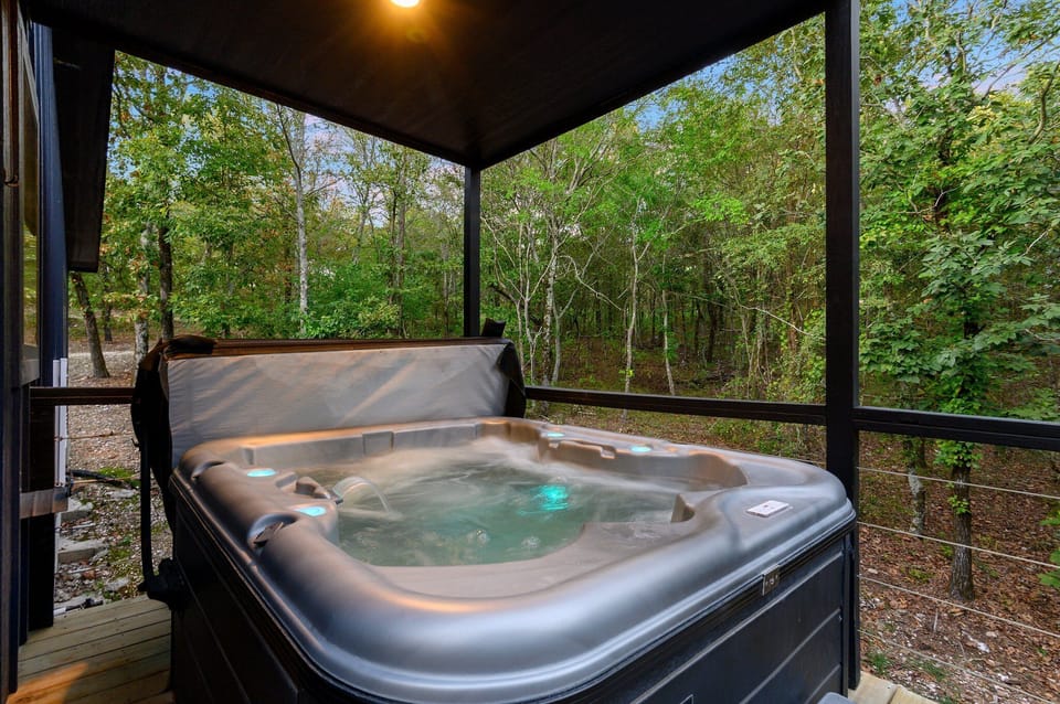 Hot Tub Oasis: Unwind in the bubbling retreat surrounded by nature's beauty!