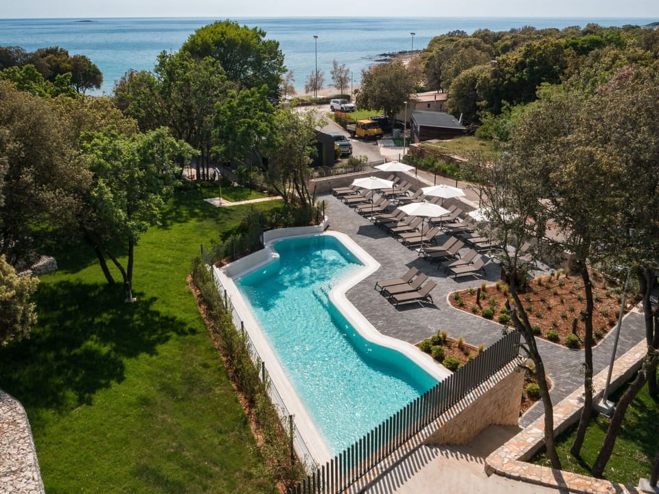 Water, Plant, Property, Building, Tree, Azure, Swimming Pool, Sky, Leisure, Urban Design