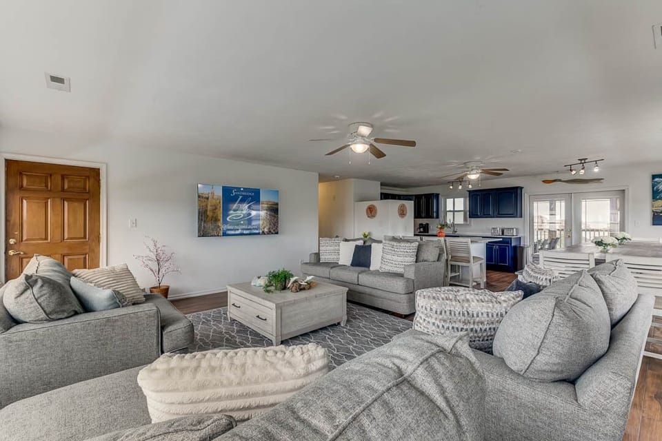 Top-Level Living Room with Access to Screened Porch