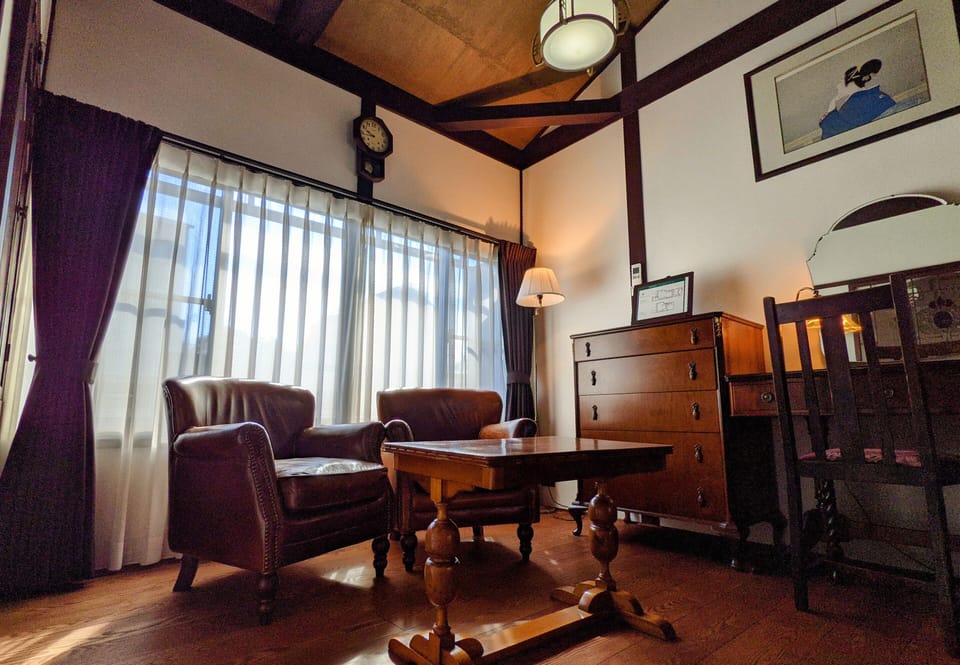 Grand Villa | Living area | 30-inch TV with digital channels