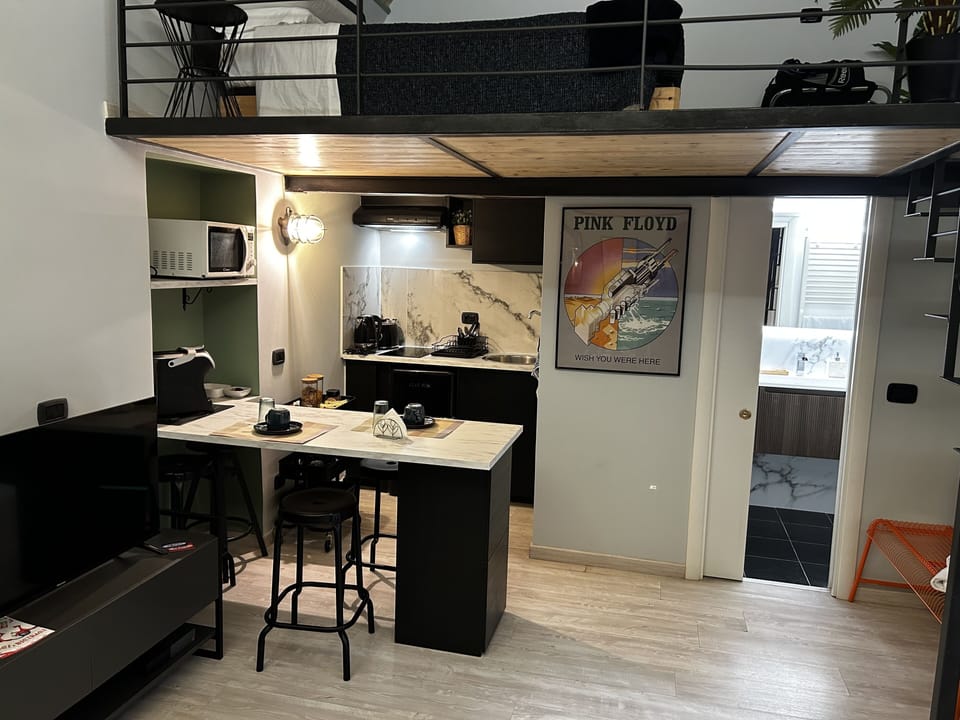 Superior Studio | Living area | Flat-screen TV