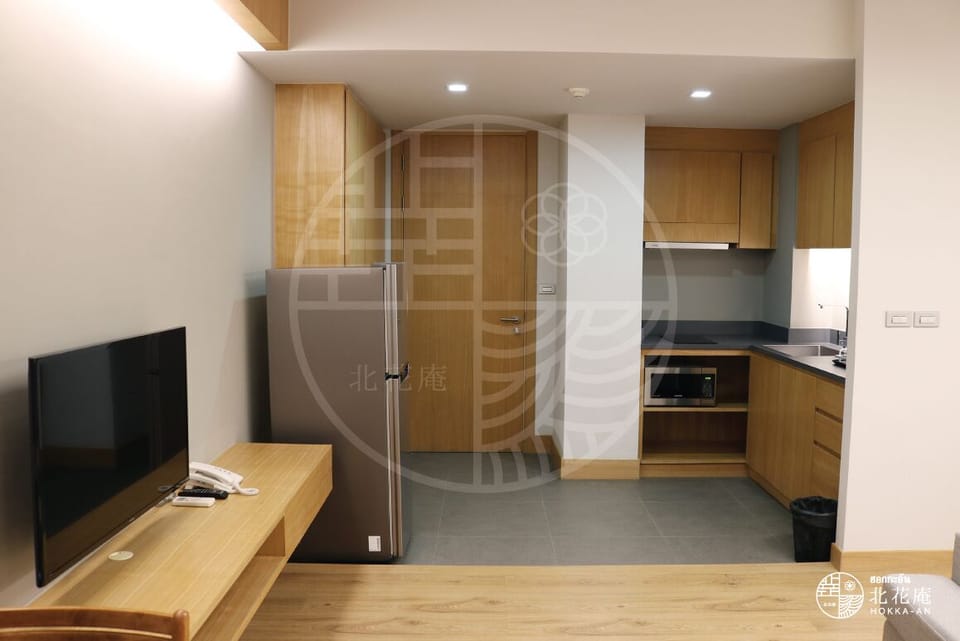 32-inch flat-screen TV with digital channels, TV