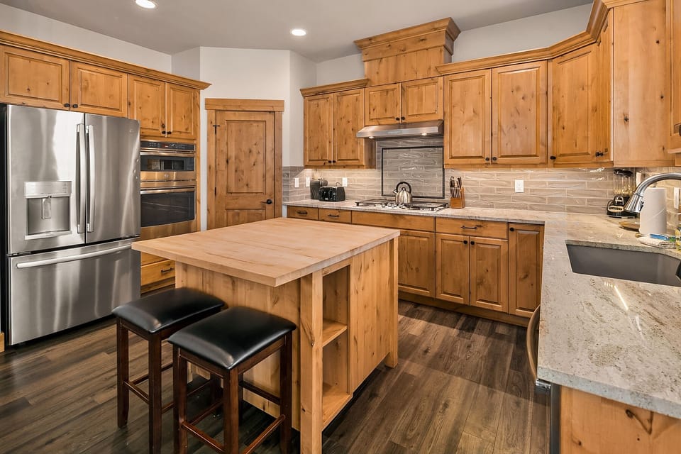 The Getaway: - Fully stocked chef's kitchen with a large center island.