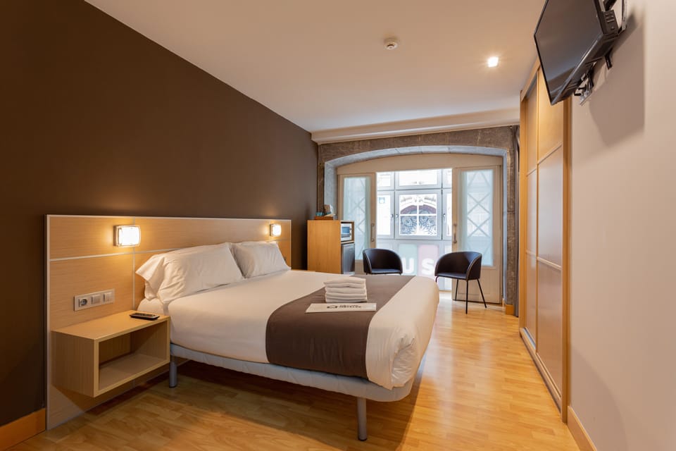 Superior Double Room | Down comforters, in-room safe, desk, iron/ironing board