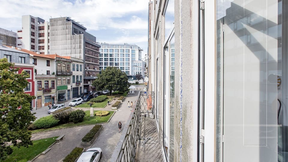 A charming street view that captures the authentic rhythm and character of Porto living.

#PortoLife #AirbnbPorto #CityViews #StayLocal