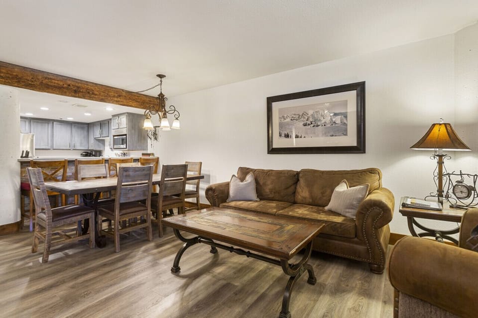 Living Room Looking Toward Dining Area and Open Style Kitchen