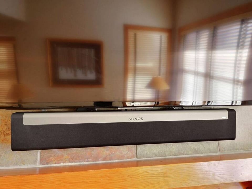 Sonos Sound System Below Flat Screen TV in Living Room