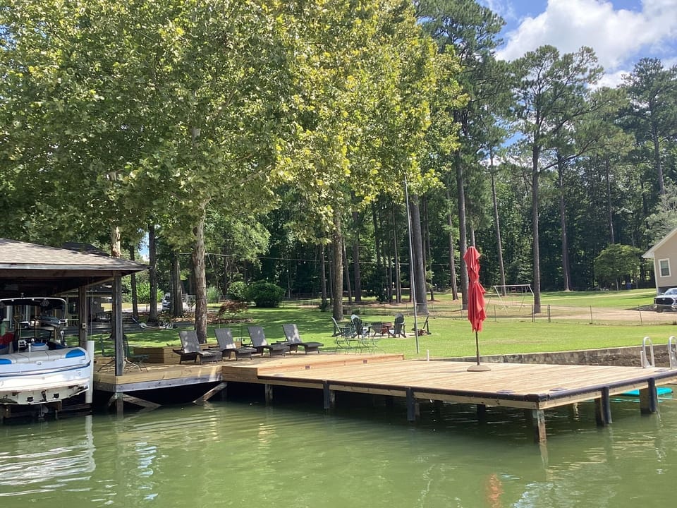 Spacious private dock for swimming (boathouse is for owner's boats)