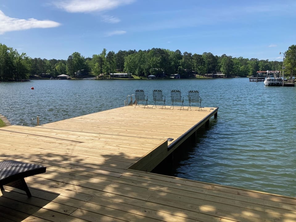 Spacious dock with bumpers and cleats to dock your boat. Enough room for 2 boats.