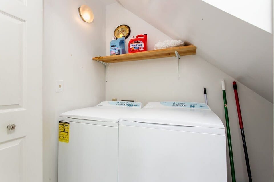 Laundry area in Full bathroom downstairs.