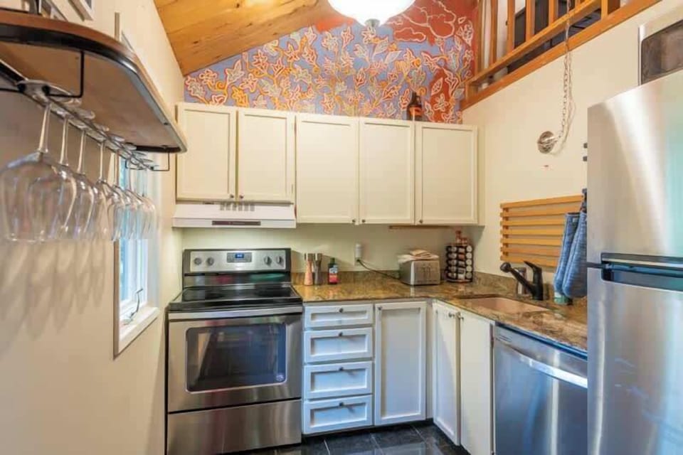 Full Kitchen with a Drip Coffee Maker and Dishwasher
