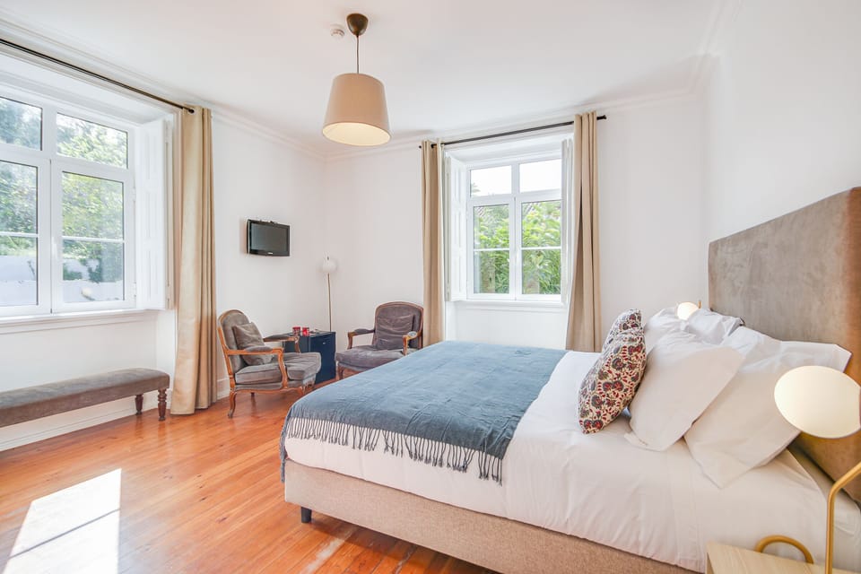 Deluxe Room, 1 Bedroom, Refrigerator, Garden View | Minibar, individually furnished, desk, soundproofing