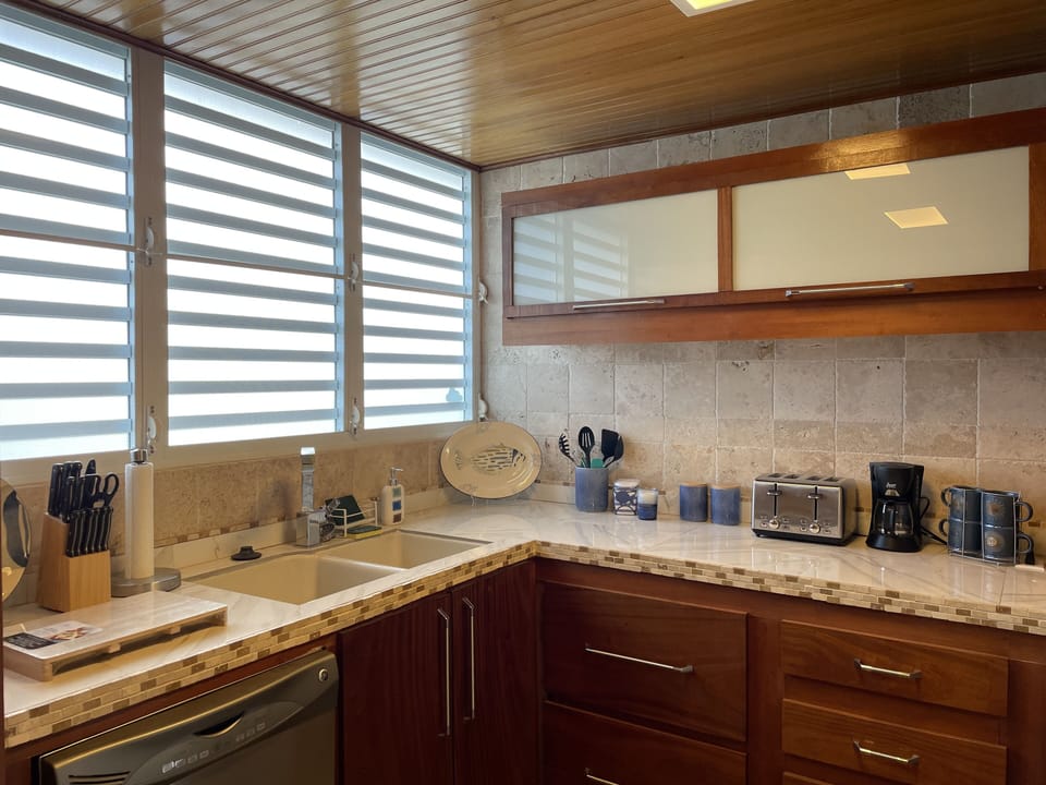 Fully stocked kitchen with all essentials to cook including oils spices & coffee