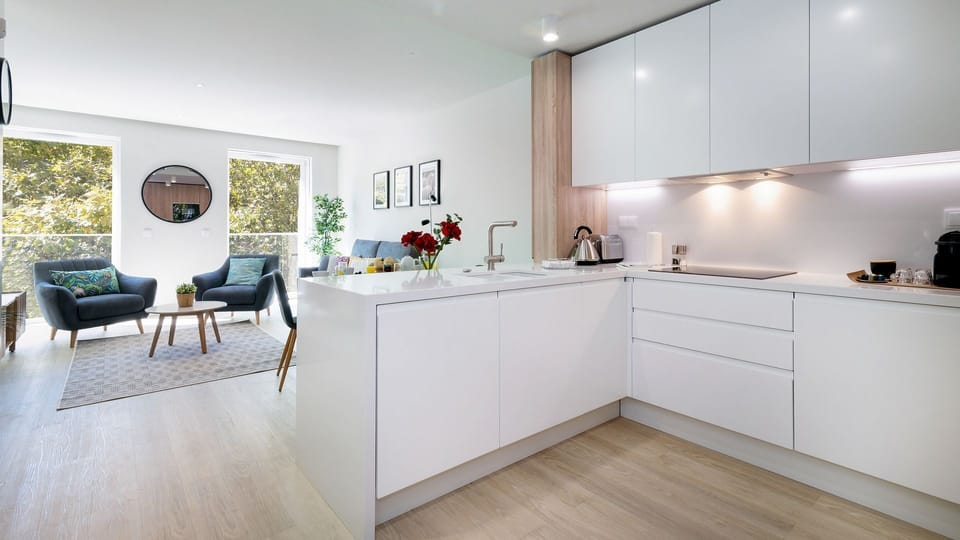 Modern Kitchenette with all the amenities you need to prepare a homecooked meal. #lisbon #airbnb #downtown