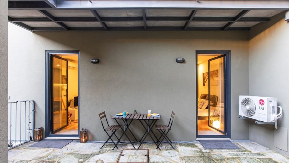 Enjoy al fresco dining or a quiet moment outdoors on your private patio, perfect for soaking up the local atmosphere.
#Patio #OutdoorDining #LovelyStay