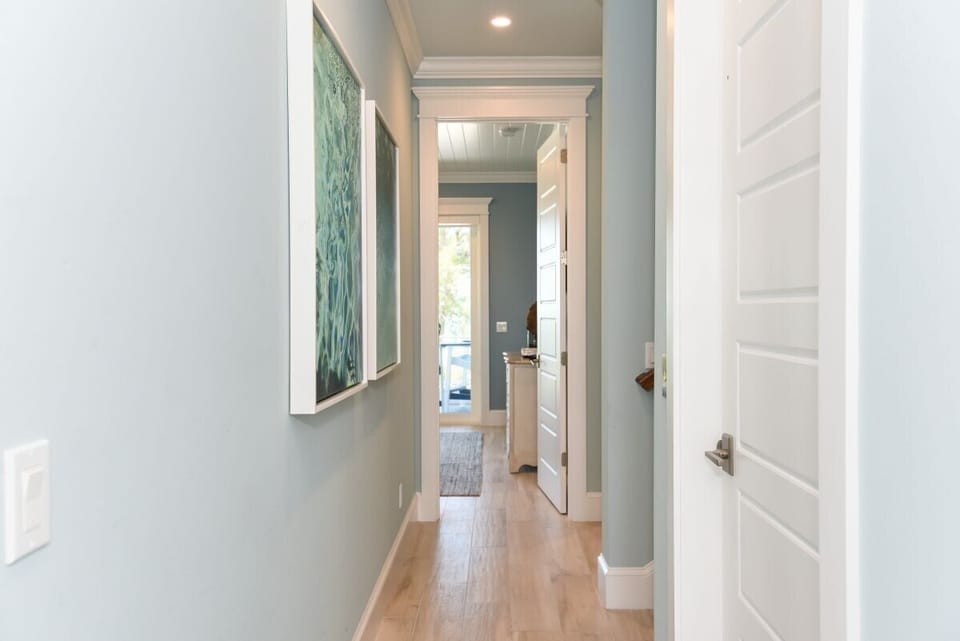 Hallway on mid level with 4 bedrooms