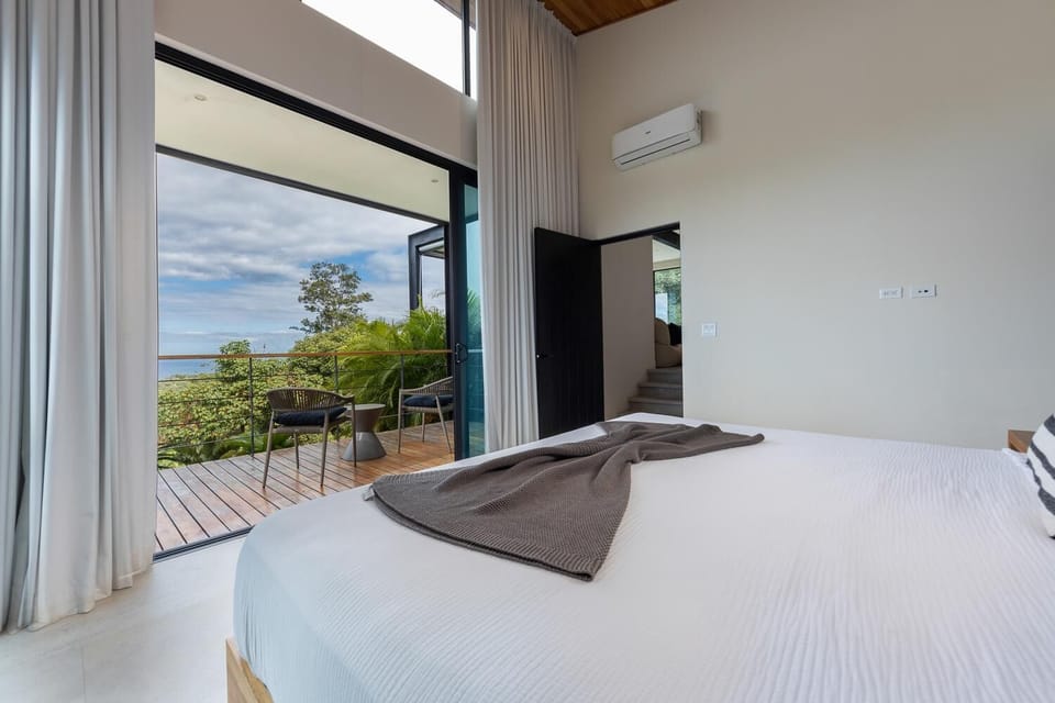 View outside the sliders to the balcony of the master bedroom.