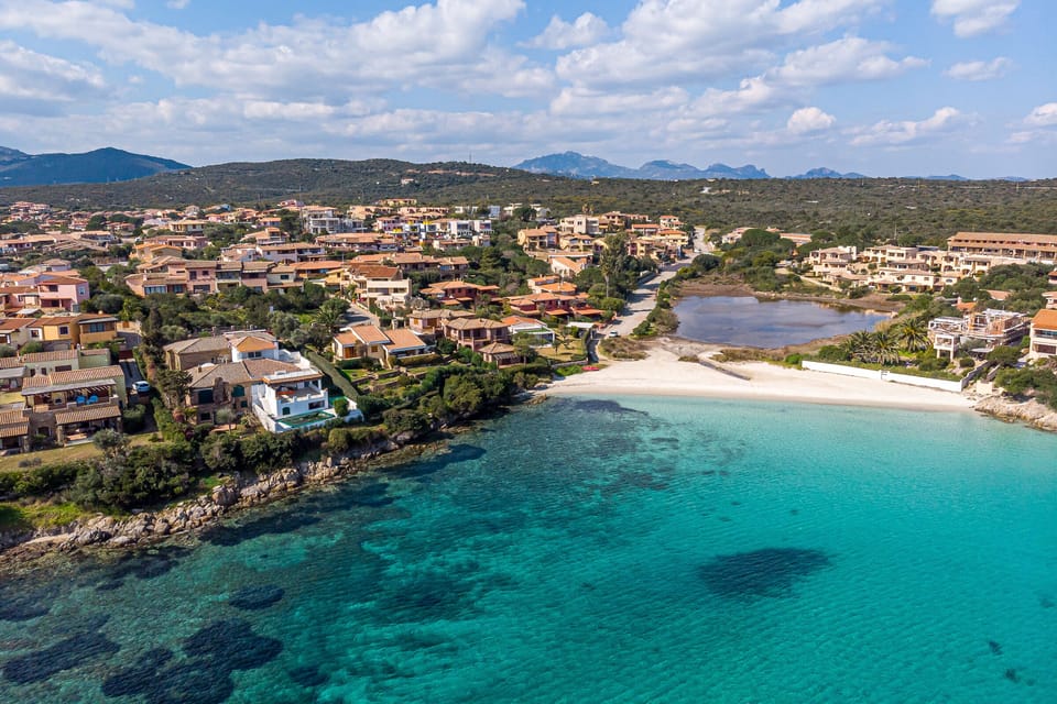 Bird view on the holiday home and sandy beach