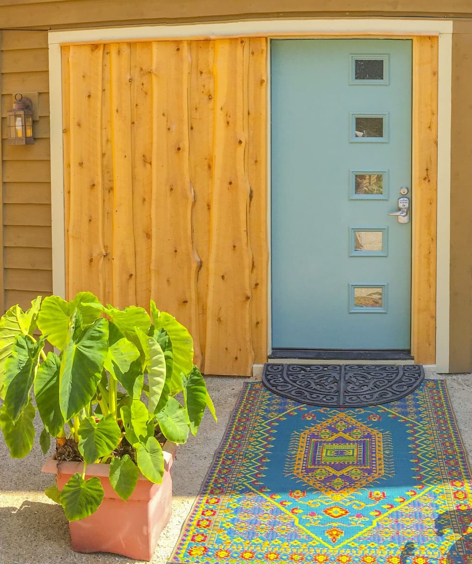 Blue door entry to The Cabin!