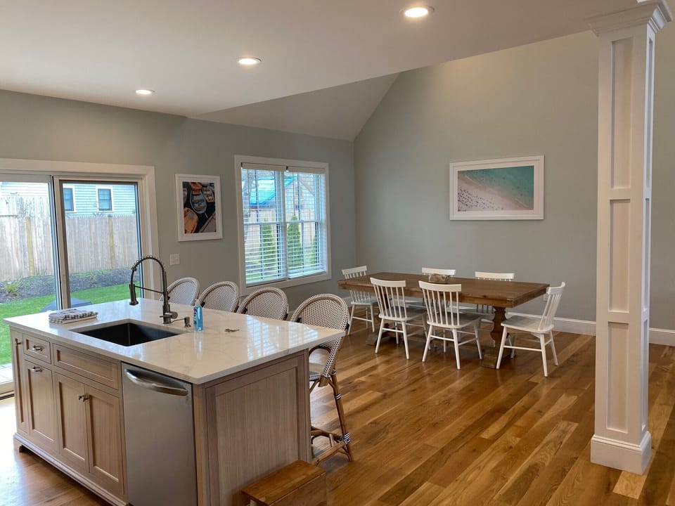 Sliding door off the kitchen leads to back patio and yard