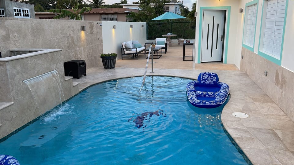Private Pool and patio with Chaise lounge chairs to sun bathe or just relax.