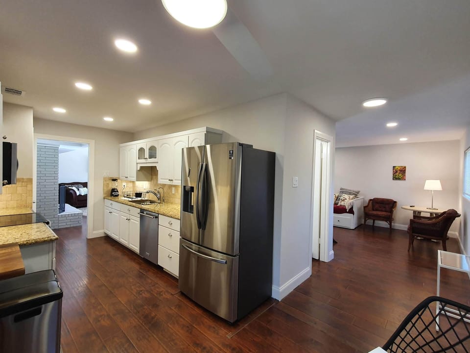 Kitchen. on the right 3d bath (half bath) and open concept bedroom #5