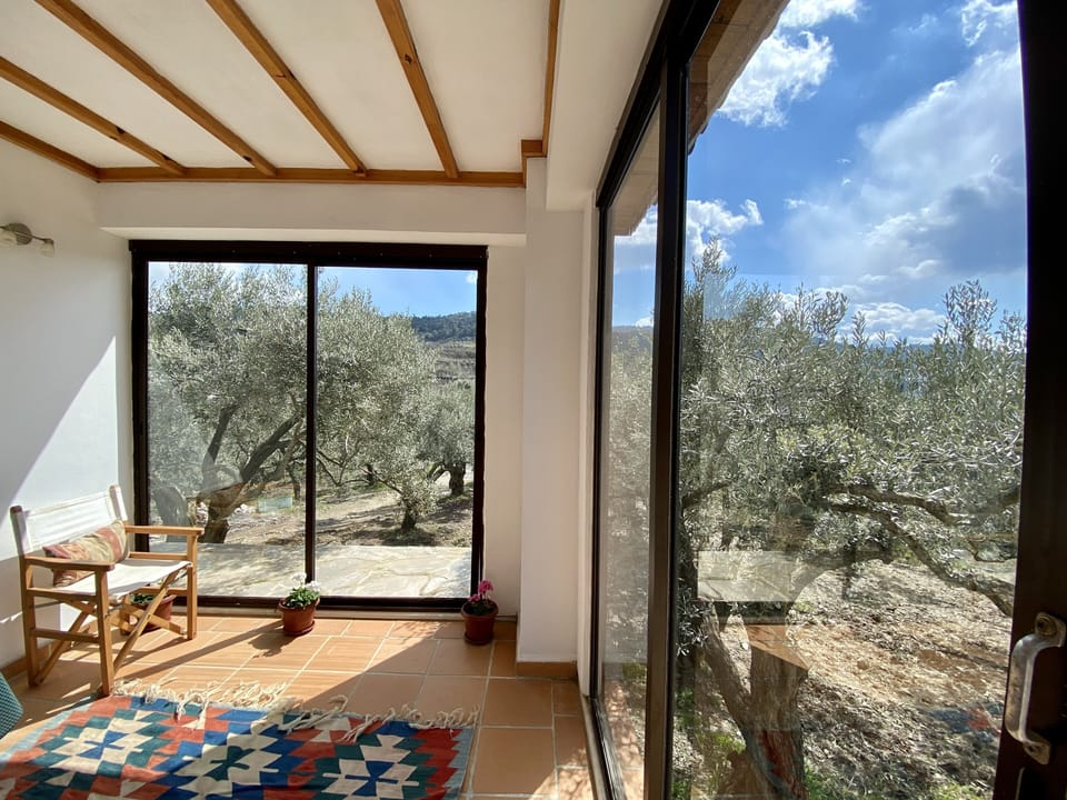 Indoor and outdoor sitting/dining area with beautiful views 