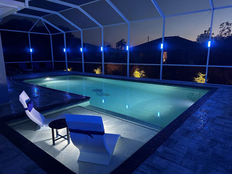 Lanai lights on the pool cage and pool LED lights for night swimming.