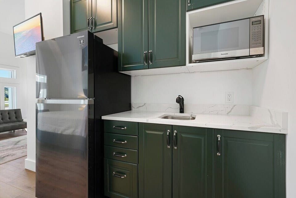 1st floor kitchenette with full size reftrigerator and microwave