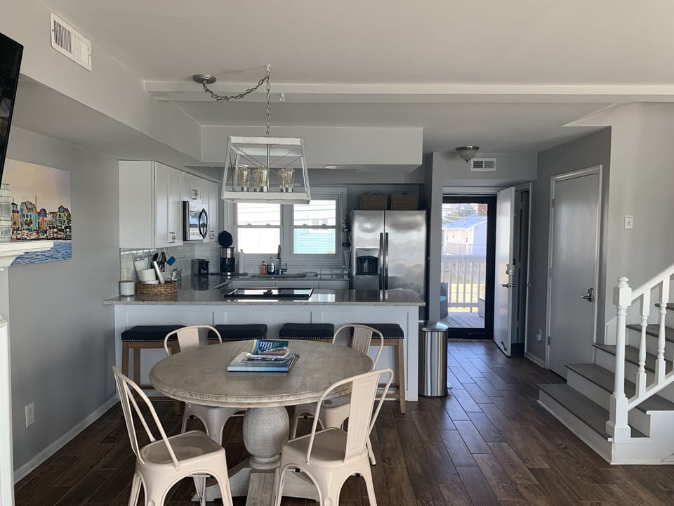Dining area, kitchen (looking toward  entry).  