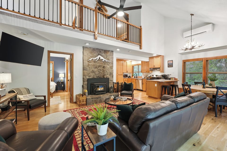 Natural light, wood accents, and forest views — mountain living at its best.
