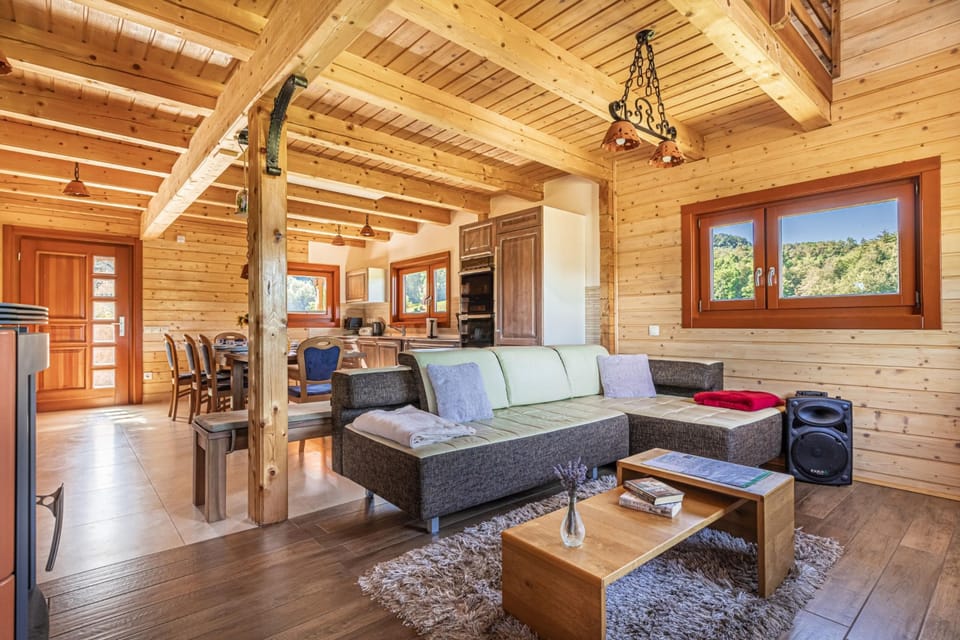Family Chalet, Multiple Bedrooms, Mountainside (House Of Nature With Sauna And Tents) | Living area | 21-inch flat-screen TV with digital channels, TV, fireplace