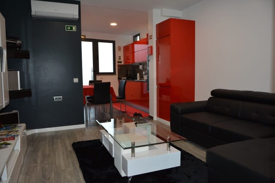 Deluxe Apartment, 1 King Bed with Sofa bed, Kitchen, Hill View | Living area | 32-inch flat-screen TV with cable channels, TV