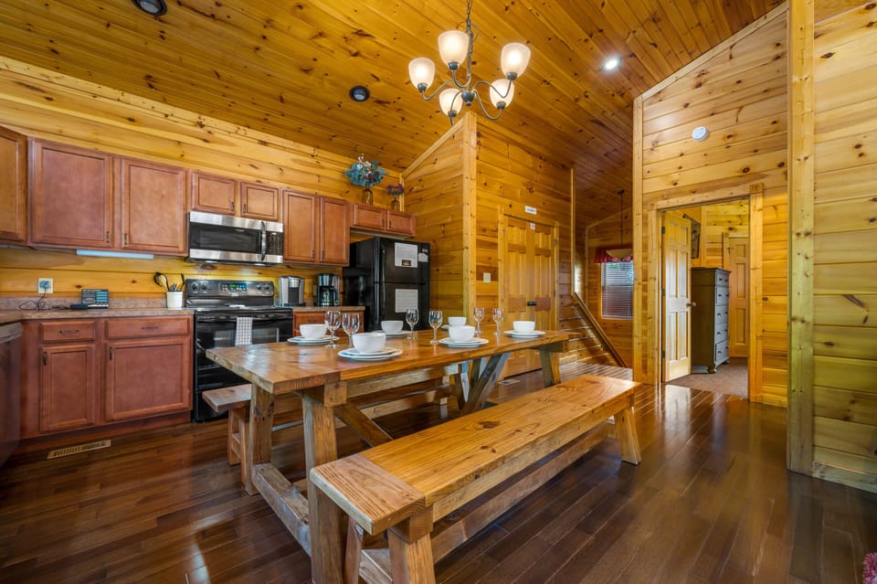 Dining area with custom wood table with benches.