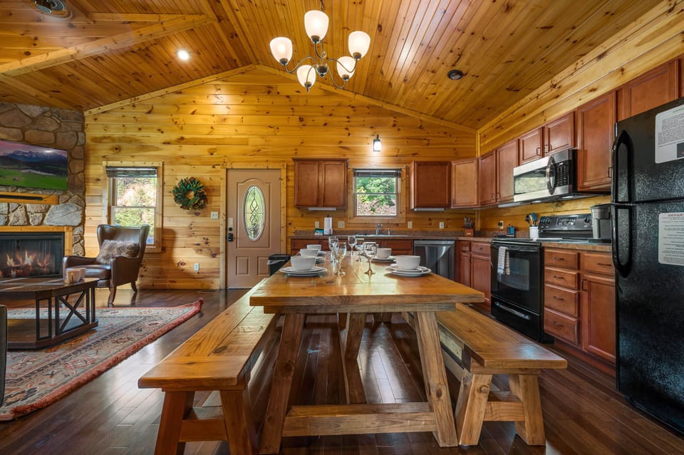 Dining area with custom wood table with benches.