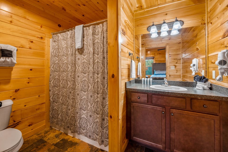 Bed 3: ensuite full bathroom with tub shower combo