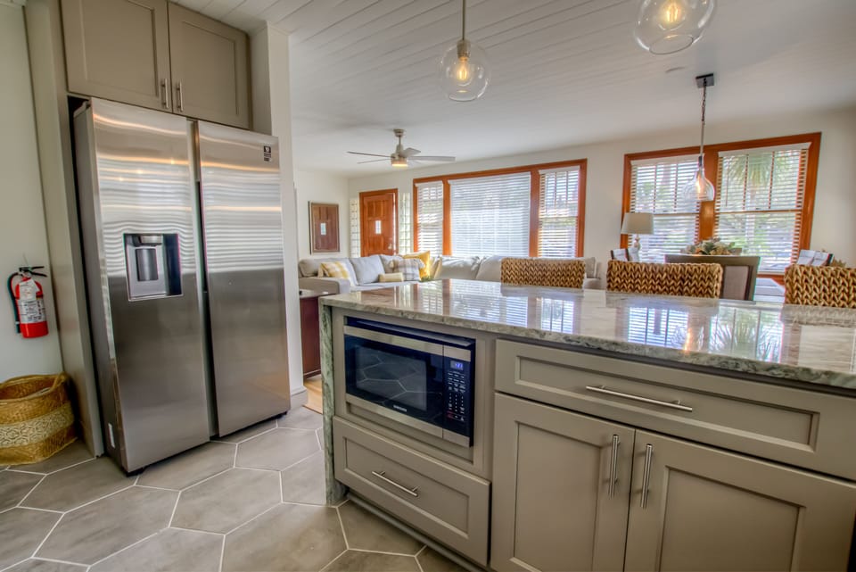 Kitchen opens to dining & living areas so you can share more time together.