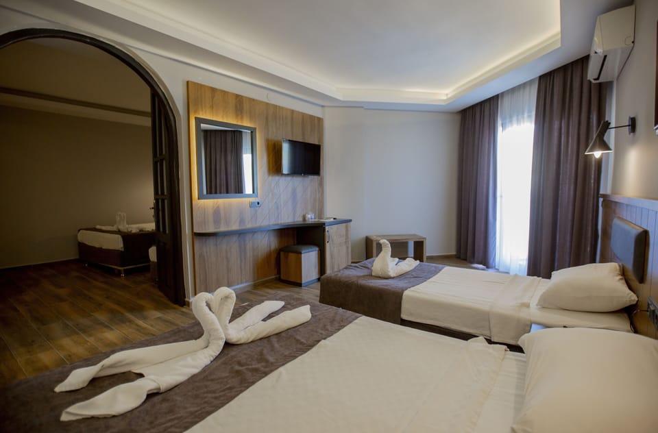 Family Room | Minibar, soundproofing, WiFi (surcharge), individually decorated