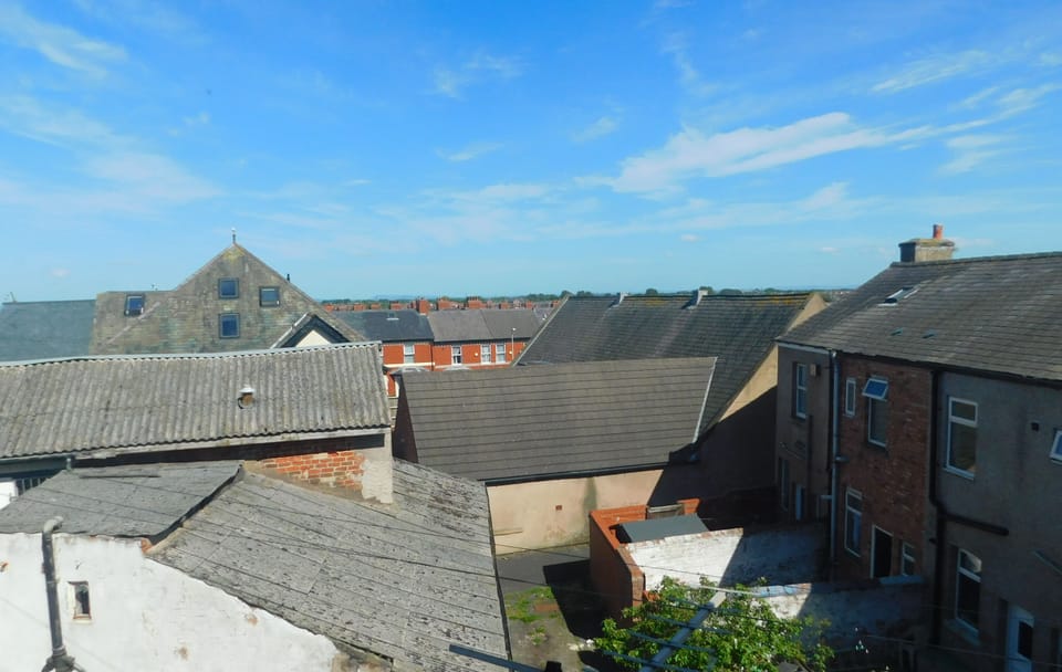 Blackout drapes, iron/ironing board, bed sheets