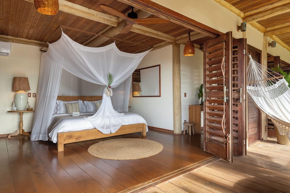 Bangalô Deluxe Térreo | 1 bedroom, premium bedding, minibar, in-room safe