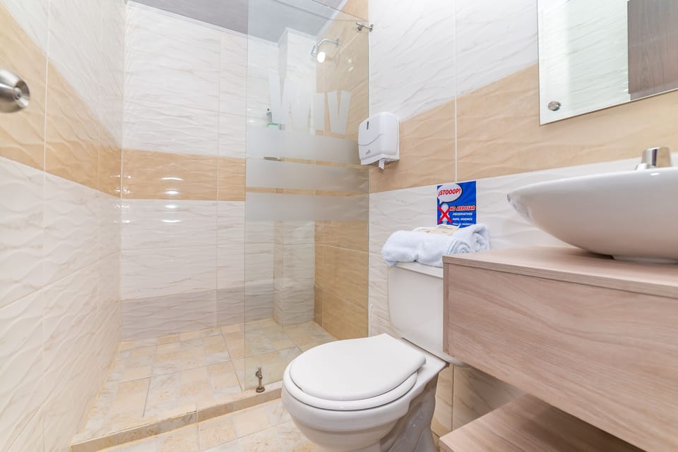 Standard Double Room | Bathroom | Shower, designer toiletries, towels, soap