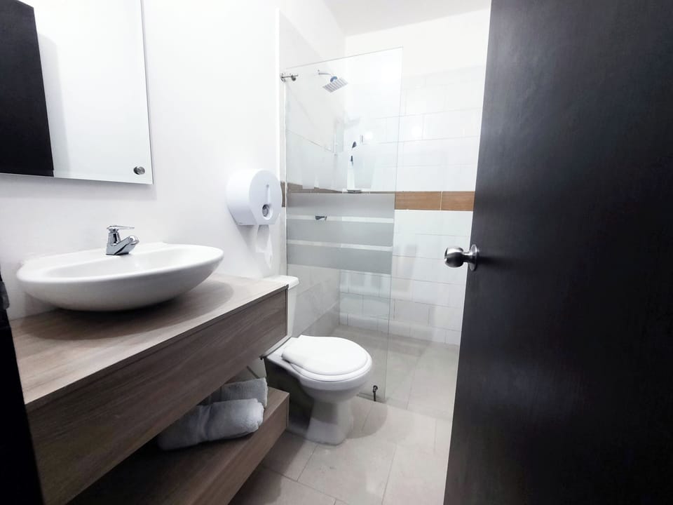 Standard Double Room | Bathroom | Shower, designer toiletries, towels, soap
