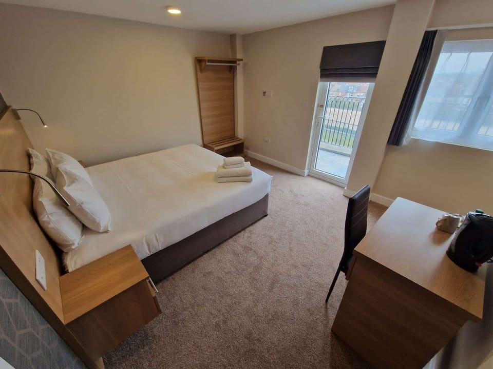 Desk, blackout drapes, iron/ironing board, free WiFi