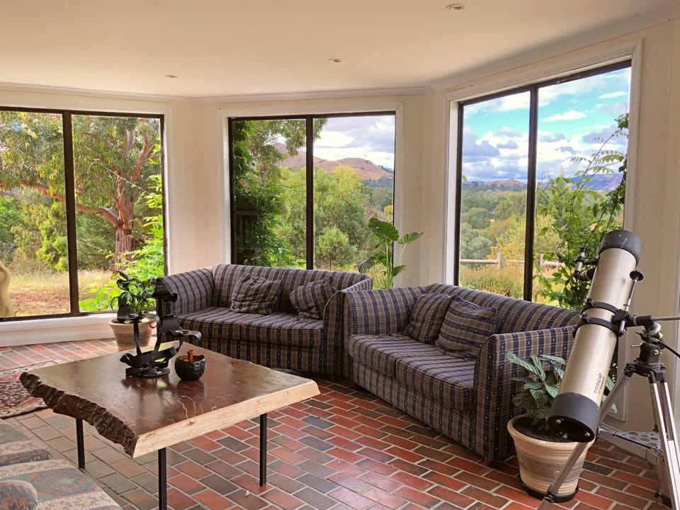 Sunroom with 180 degree views of the rolling Victorian High Country hills 