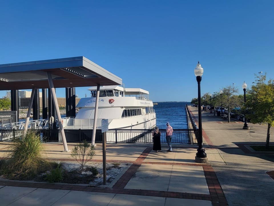 Go to the website of Pensacola Ferry. Cruises are sunset cruises, Beach & Ft. Pickens, or Blue Angels practice. Tickets approx. $35/each  Another option is a dolphin cruise from Pcola Beach.